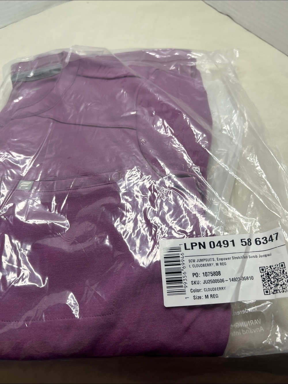 New w tags Fabletics Cloudberry Purple scrubs Jumpsuit medium size